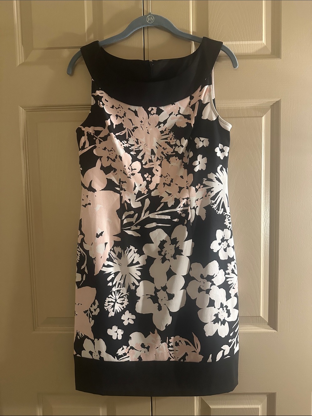 Beautiful Connected Apparel sheath dress in a timeless black floral print